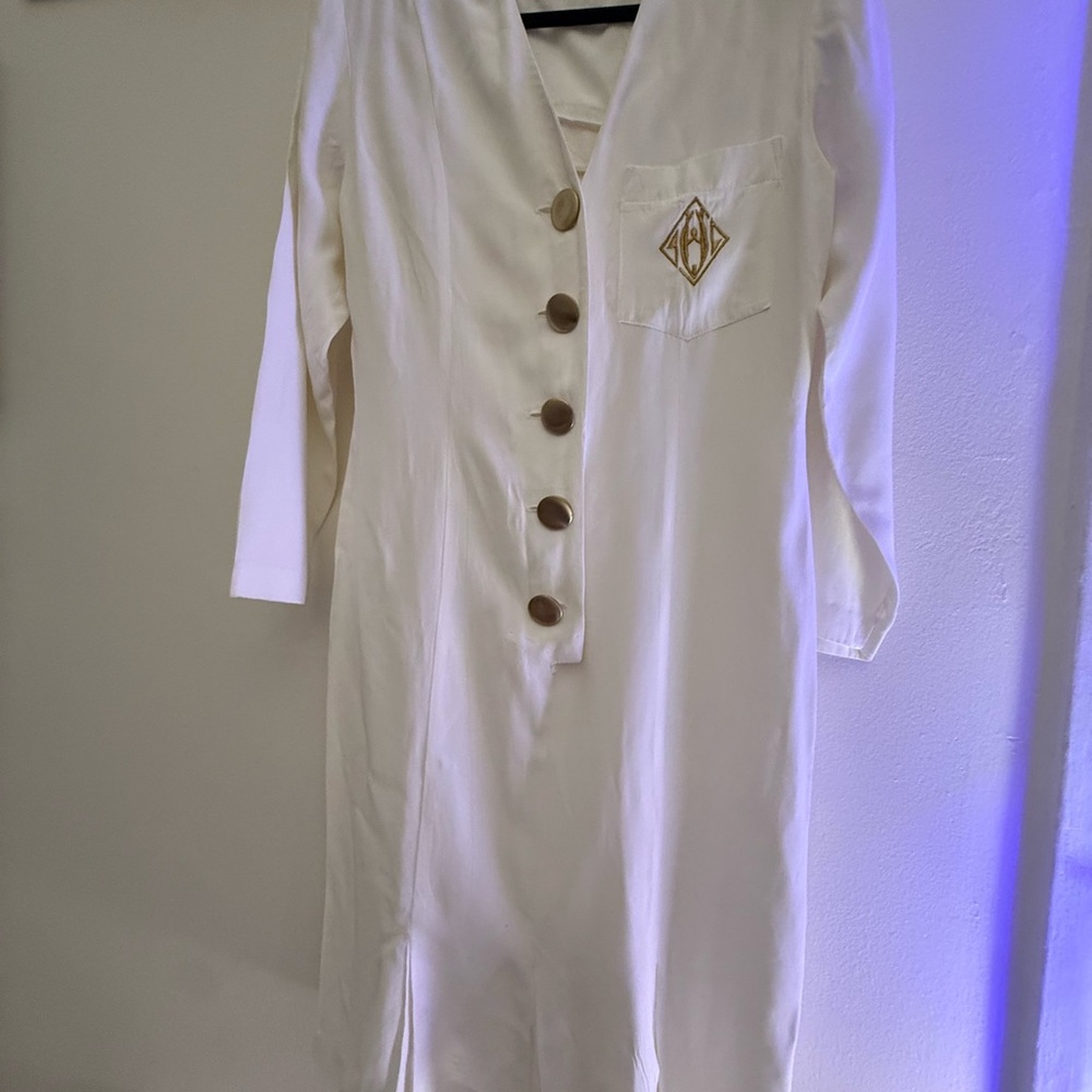 White vintage Michael B. Ltd. jumpsuit with gold monogram